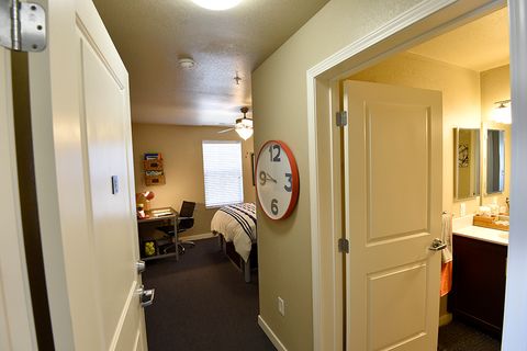 hallway with large clock