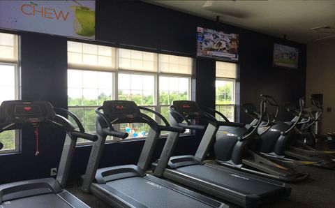 several treadmills in a gym